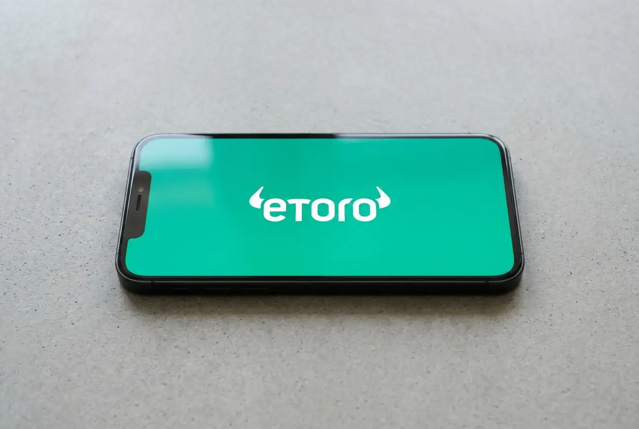 eToro Hits 52-Week Low at $23.96 as Analysts Cut Estimates